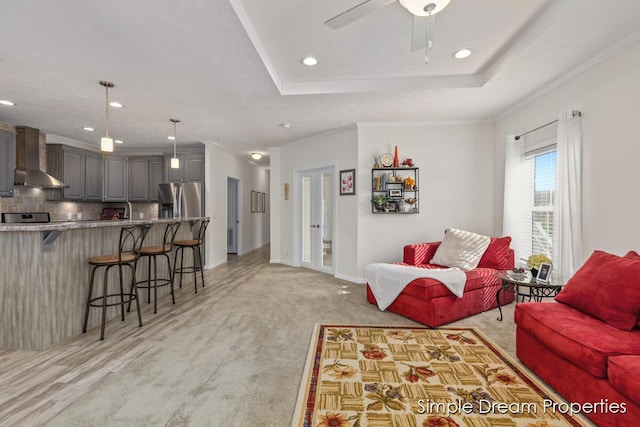living room with crown molding, baseboards, ceiling fan, recessed lighting, and french doors