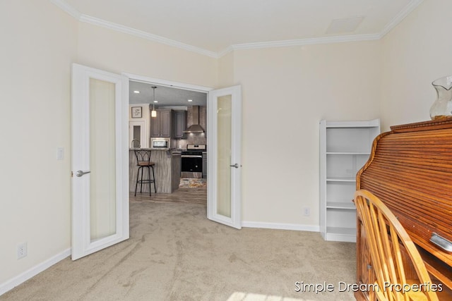 interior space featuring crown molding, baseboards, and light carpet