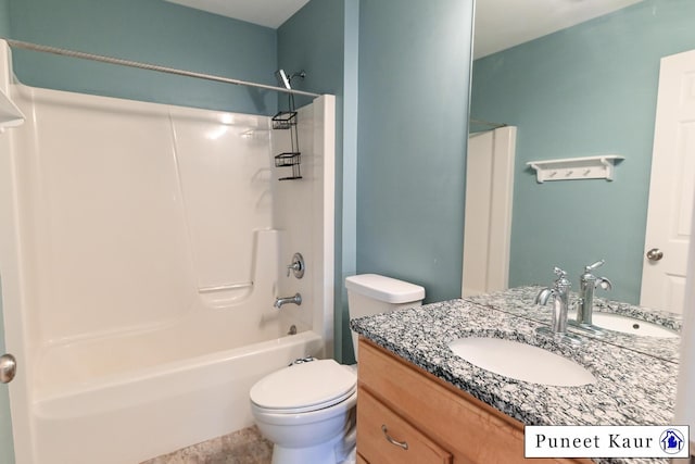 full bathroom with vanity, shower / bathing tub combination, and toilet