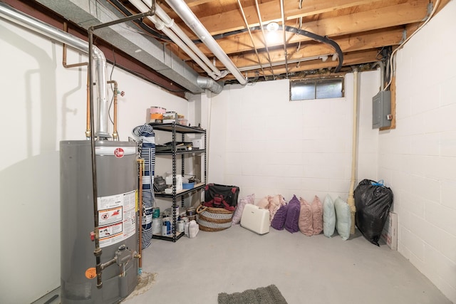 unfinished below grade area featuring water heater
