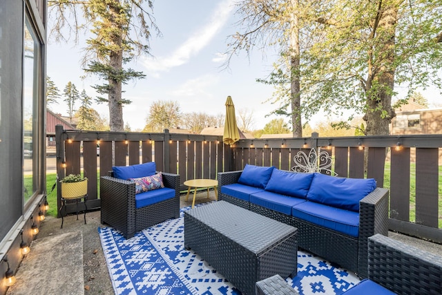wooden terrace featuring an outdoor living space