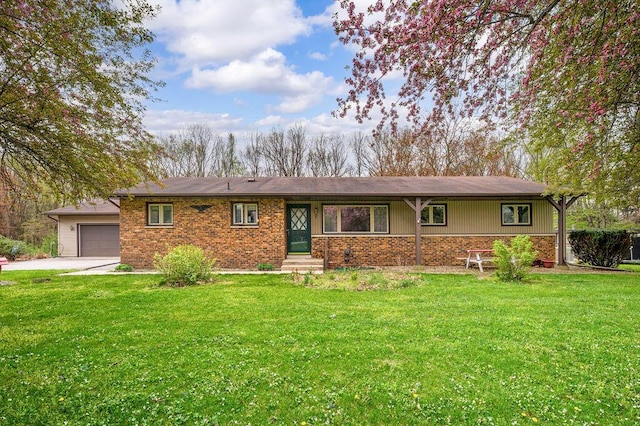 ranch-style home featuring concrete driveway, brick siding, an attached garage, and a front yard