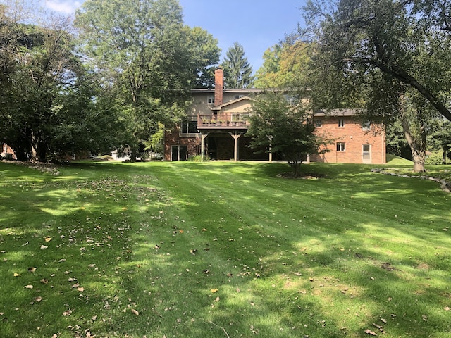 view of yard with a deck