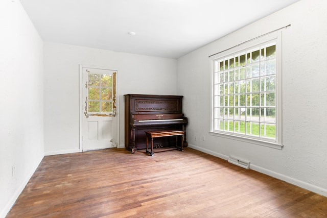 50505 Geddes Rd, Canton, MI 48188 - sitting room featuring baseboards, wood finished floors, and visible vents
