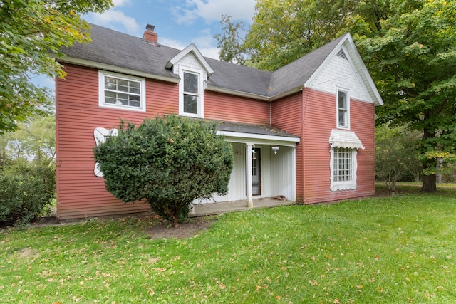 50505 Geddes Rd, Canton, MI 48188 - rear view of property featuring a yard and a chimney