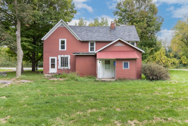 50505 Geddes Rd, Canton, MI 48188 - rear view of property featuring a lawn and a chimney