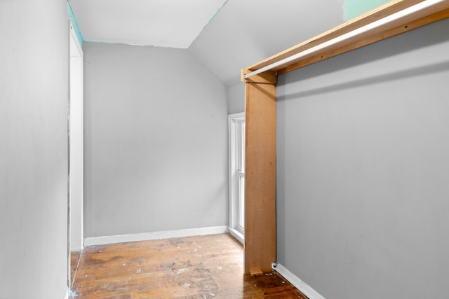 50505 Geddes Rd, Canton, MI 48188 - spacious closet featuring vaulted ceiling and wood finished floors