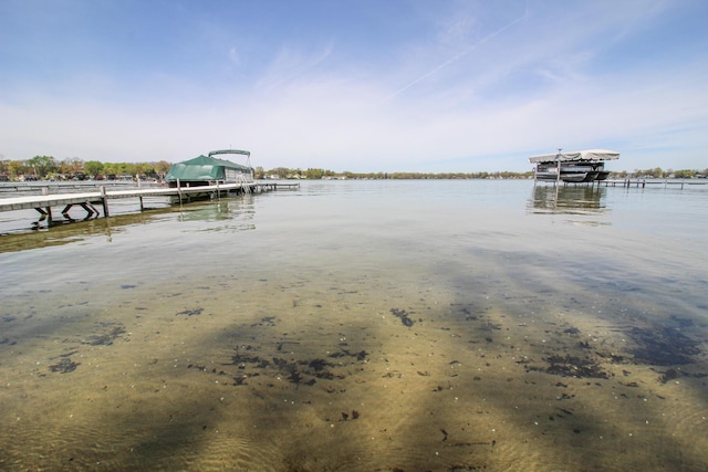 dock area featuring a water view and boat lift
