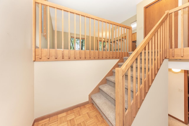 stairway with baseboards