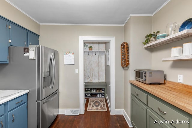 kitchen with dark wood-style flooring, visible vents, open shelves, stainless steel fridge with ice dispenser, and baseboards