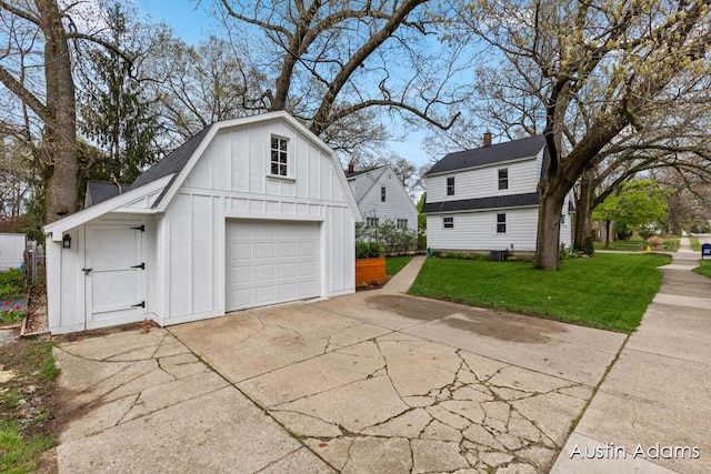 garage featuring concrete driveway and a garage