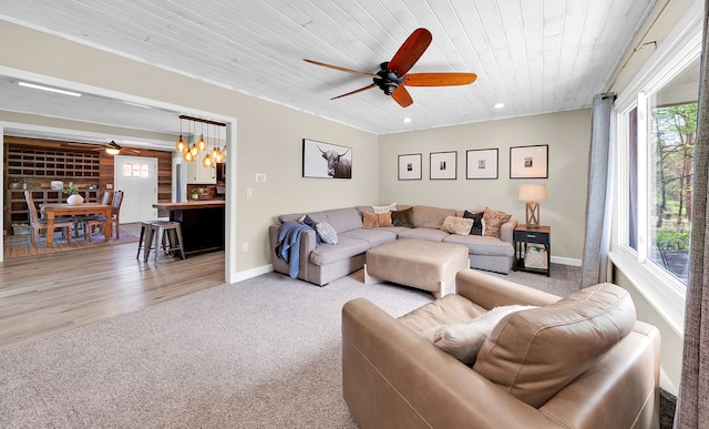 1205 Mckail Rd, Leonard, MI 48367 - living room with ceiling fan, wood ceiling, carpet, recessed lighting, and baseboards