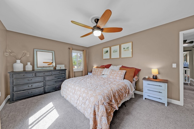 1205 Mckail Rd, Leonard, MI 48367 - bedroom with carpet floors, baseboards, and ceiling fan
