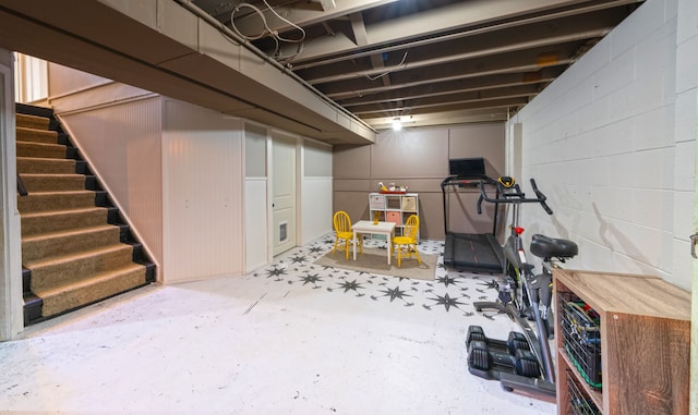1205 Mckail Rd, Leonard, MI 48367 - finished basement featuring stairway and tile patterned floors