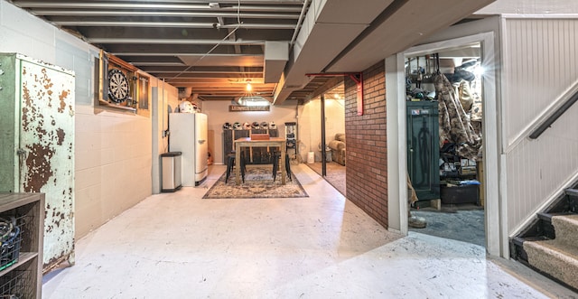 1205 Mckail Rd, Leonard, MI 48367 - unfinished below grade area with water heater