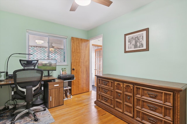 office area with ceiling fan and light wood-style floors