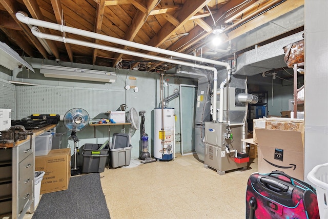 unfinished below grade area featuring water heater, heating unit, and tile patterned floors
