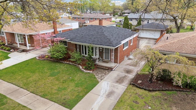 view of front facade featuring a residential view, brick siding, a shingled roof, and covered porch