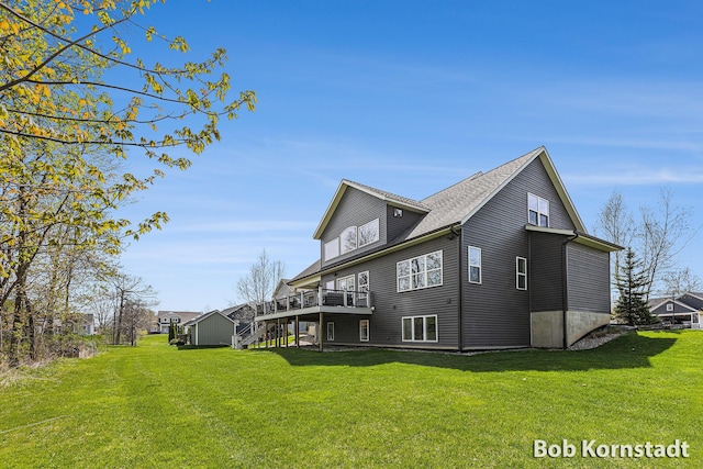 3779 Mesa Verde Dr, Hudsonville, MI 49426 - rear view of property with stairway, a yard, and a wooden deck