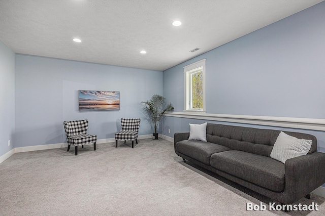 3779 Mesa Verde Dr, Hudsonville, MI 49426 - carpeted living room with baseboards, recessed lighting, and visible vents
