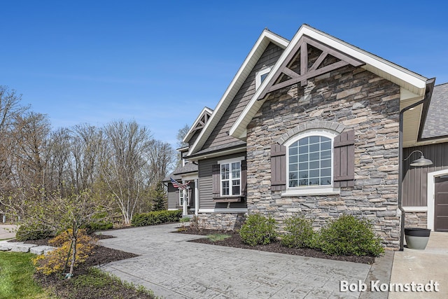 3779 Mesa Verde Dr, Hudsonville, MI 49426 - view of property exterior with stone siding