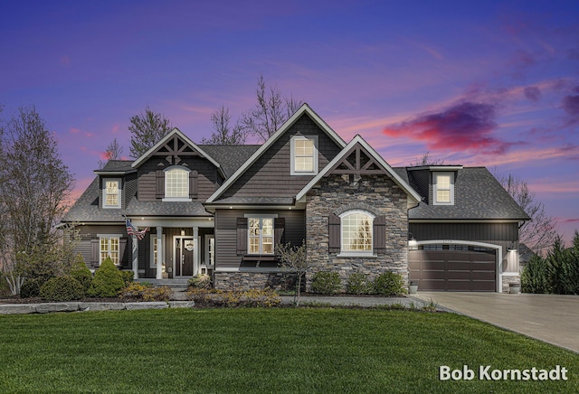 3779 Mesa Verde Dr, Hudsonville, MI 49426 - craftsman-style home with a garage, a front lawn, driveway, and stone siding