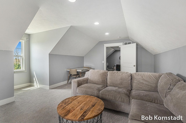 3779 Mesa Verde Dr, Hudsonville, MI 49426 - carpeted living room with baseboards, vaulted ceiling, recessed lighting, and visible vents