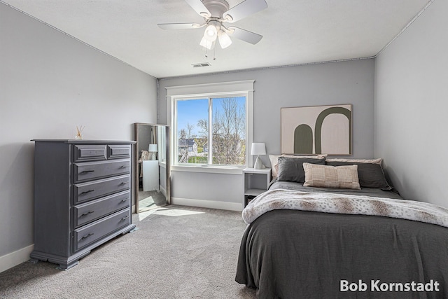 3779 Mesa Verde Dr, Hudsonville, MI 49426 - carpeted bedroom with baseboards, a ceiling fan, and visible vents