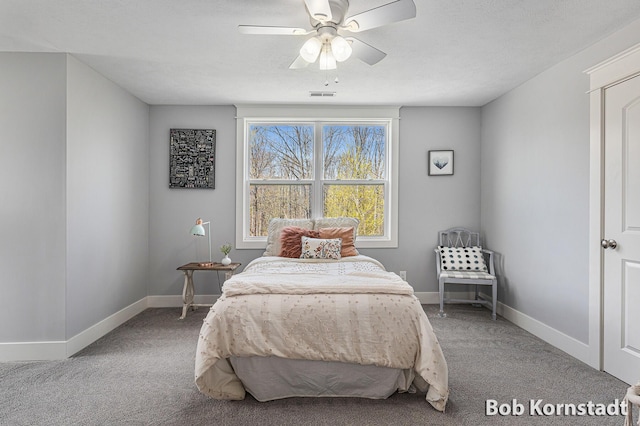 3779 Mesa Verde Dr, Hudsonville, MI 49426 - carpeted bedroom featuring visible vents, a ceiling fan, and baseboards