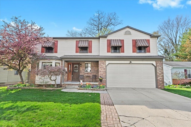 traditional-style home with brick siding, driveway, a front yard, and a garage