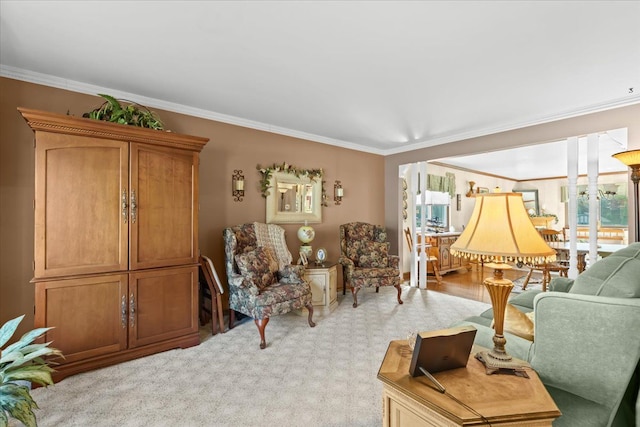 living area with ornamental molding and light carpet
