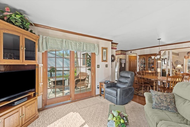 living area featuring crown molding