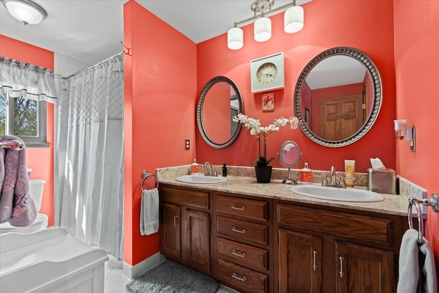 bathroom with a sink, tile patterned floors, double vanity, and a shower with shower curtain