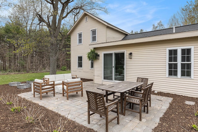 view of patio / terrace featuring an outdoor living space and outdoor dining area