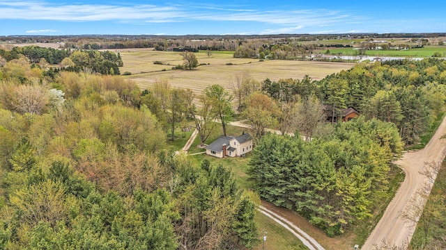 birds eye view of property featuring a rural view