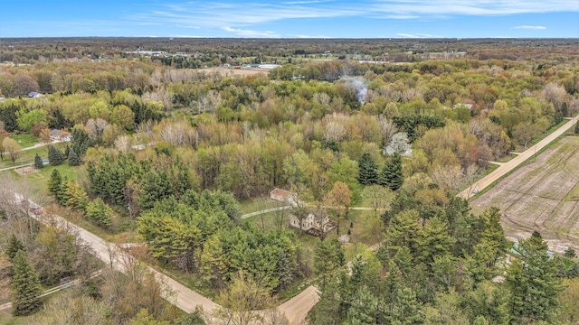 aerial view featuring a view of trees