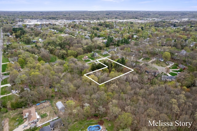 bird's eye view with a forest view