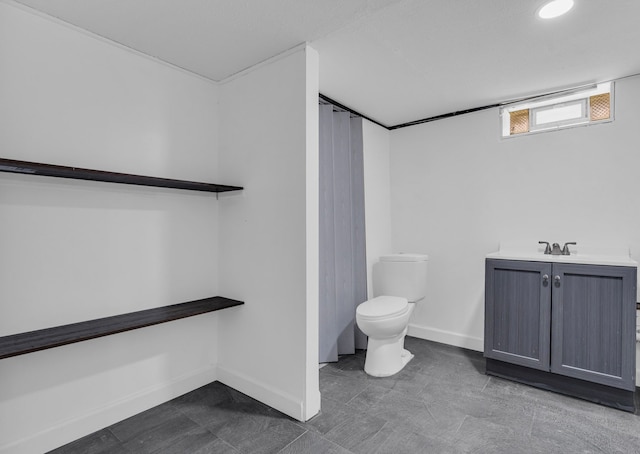 19950 Gilchrist St, Detroit, MI 48235 - bathroom with recessed lighting, vanity, baseboards, and toilet