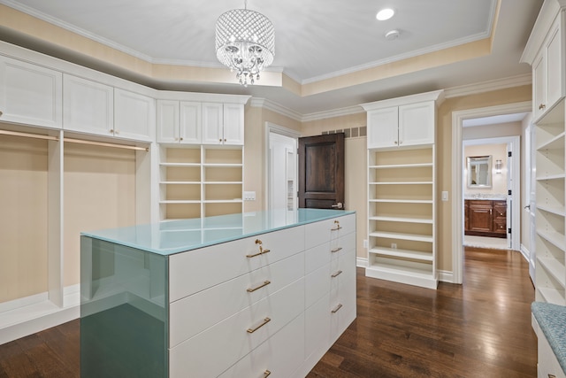 5820 Lakeview Ave, Orchard Lake, MI 48323 - walk in closet with dark wood-style flooring and an inviting chandelier