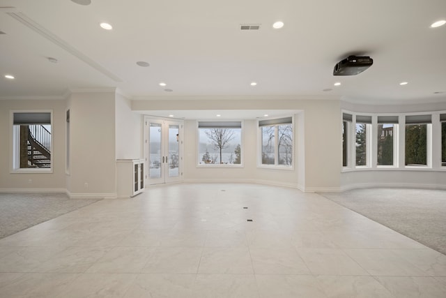5820 Lakeview Ave, Orchard Lake, MI 48323 - unfurnished living room with recessed lighting, visible vents, ornamental molding, and light carpet