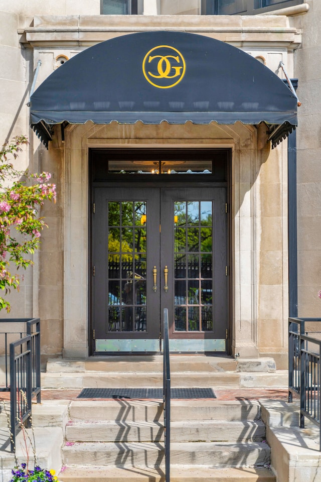 entrance to property featuring french doors
