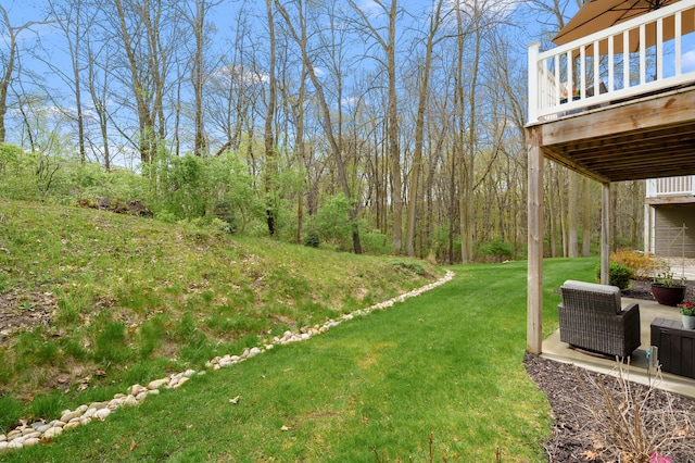 view of yard with a wooden deck