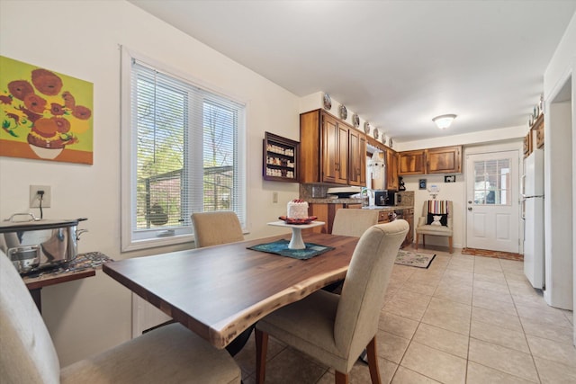 dining room with light tile patterned floors