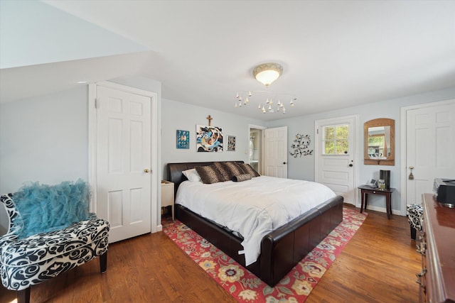 bedroom with wood finished floors
