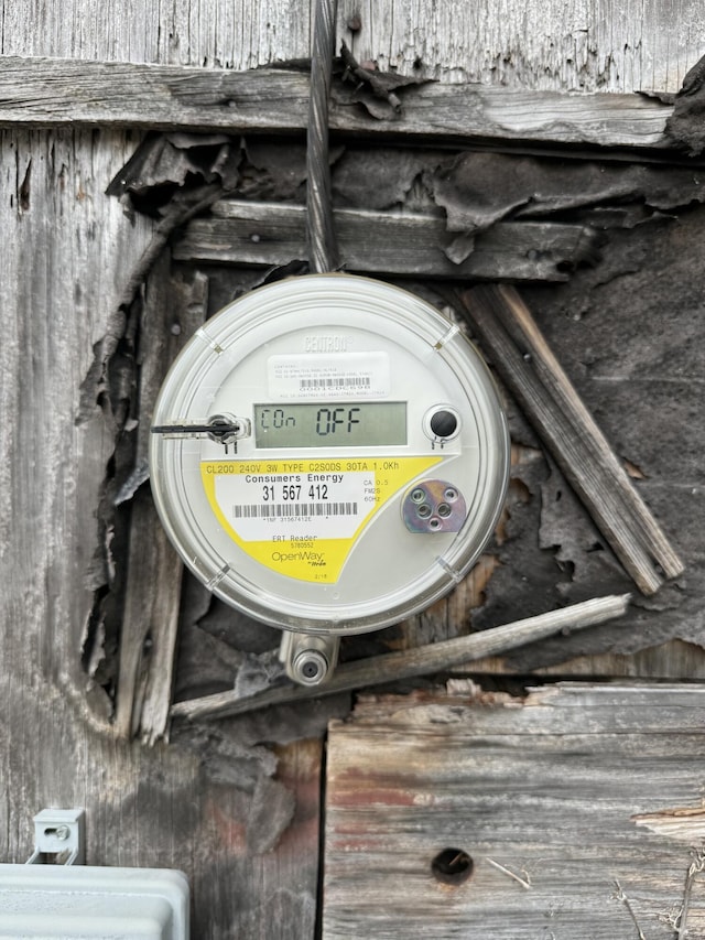 exterior details featuring electric meter