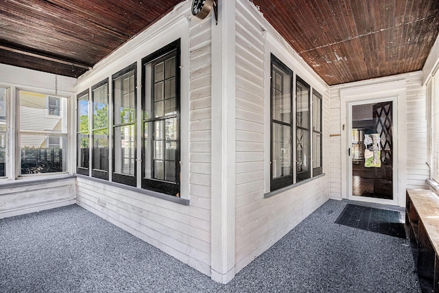 view of property exterior featuring a porch