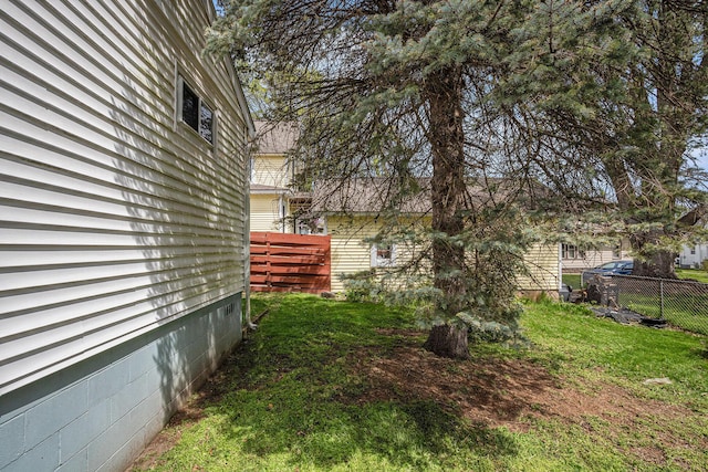 view of yard with fence