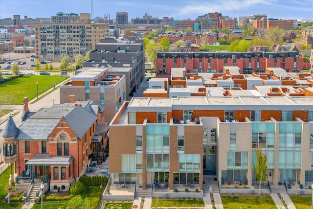 birds eye view of property with a view of city