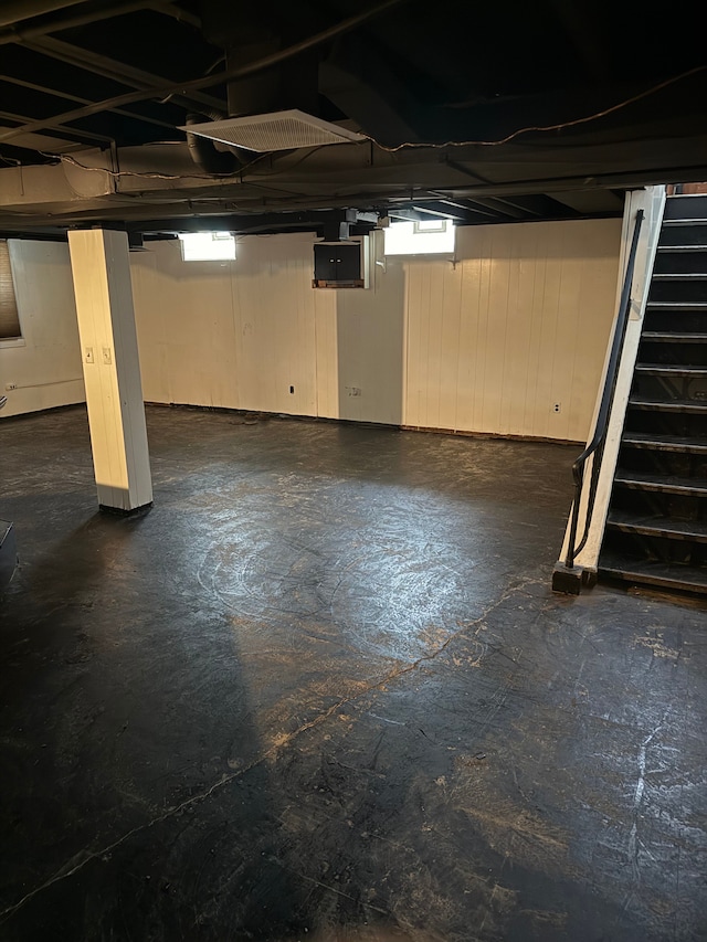 below grade area featuring plenty of natural light and stairway