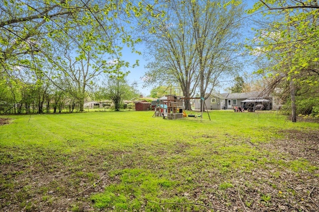 view of yard with a playground